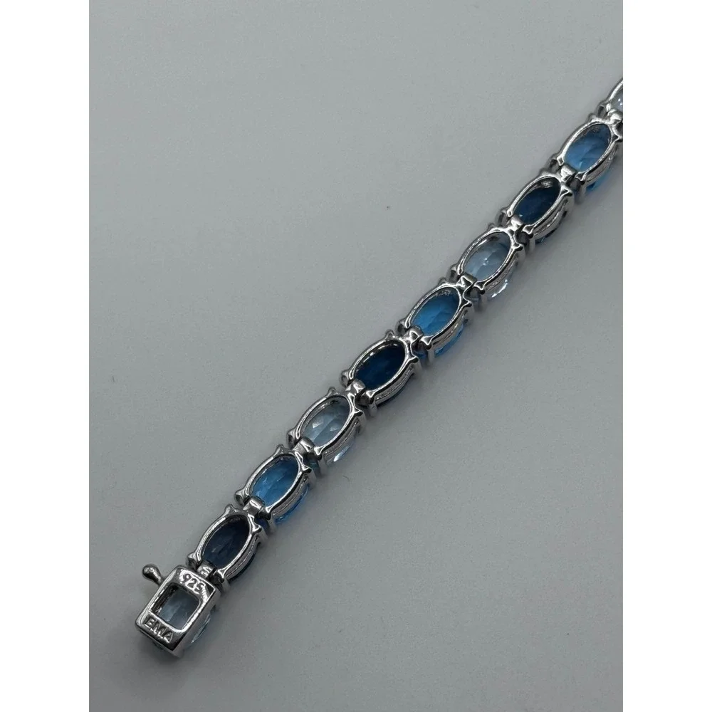 EMA Signed Sterling Silver Shades of Blue Tennis Bracelet